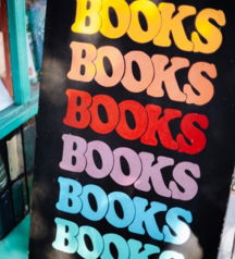 colorful-sign-advertising-books-with-an-arrow-.jpg Colorful sign advertising books with an arrow.